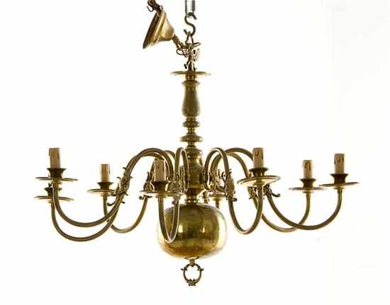 Appraisal: Dutch brass chandelier eight lights on scrolling arms with dolphin-stylized