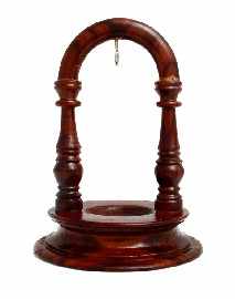 Appraisal: A wooden stand with hanging hook