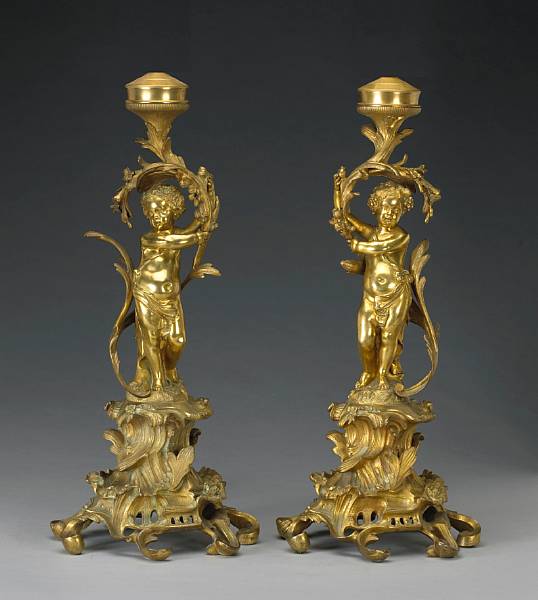 Appraisal: A pair of Belle poque gilt and patinated bronze lamps