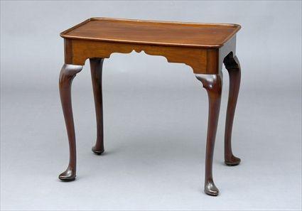 Appraisal: GEORGE II MAHOGANY SILVER TABLE The dished top above a