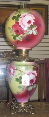 Appraisal: AN AMERICAN VICTORIAN GONE-WITH-THE-WIND GLASS TABLE LAMP The hand painted