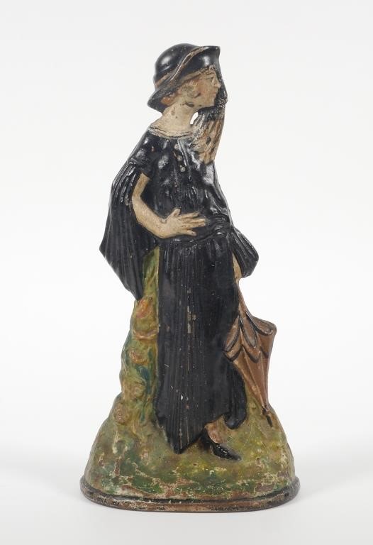 Appraisal: Antique cast iron flapper lady doorstop by Toledo Stove Range