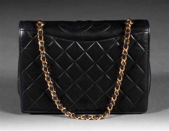 Appraisal: Chanel black leather quilted purse with a chain-link and leather