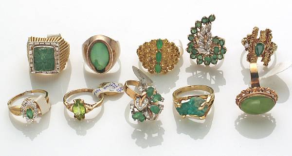 Appraisal: A collection of ten diamond jade emerald peridot and gold