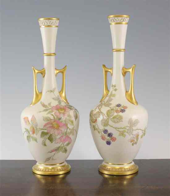 Appraisal: Two Royal Worcester ivory ground two handled vases the first