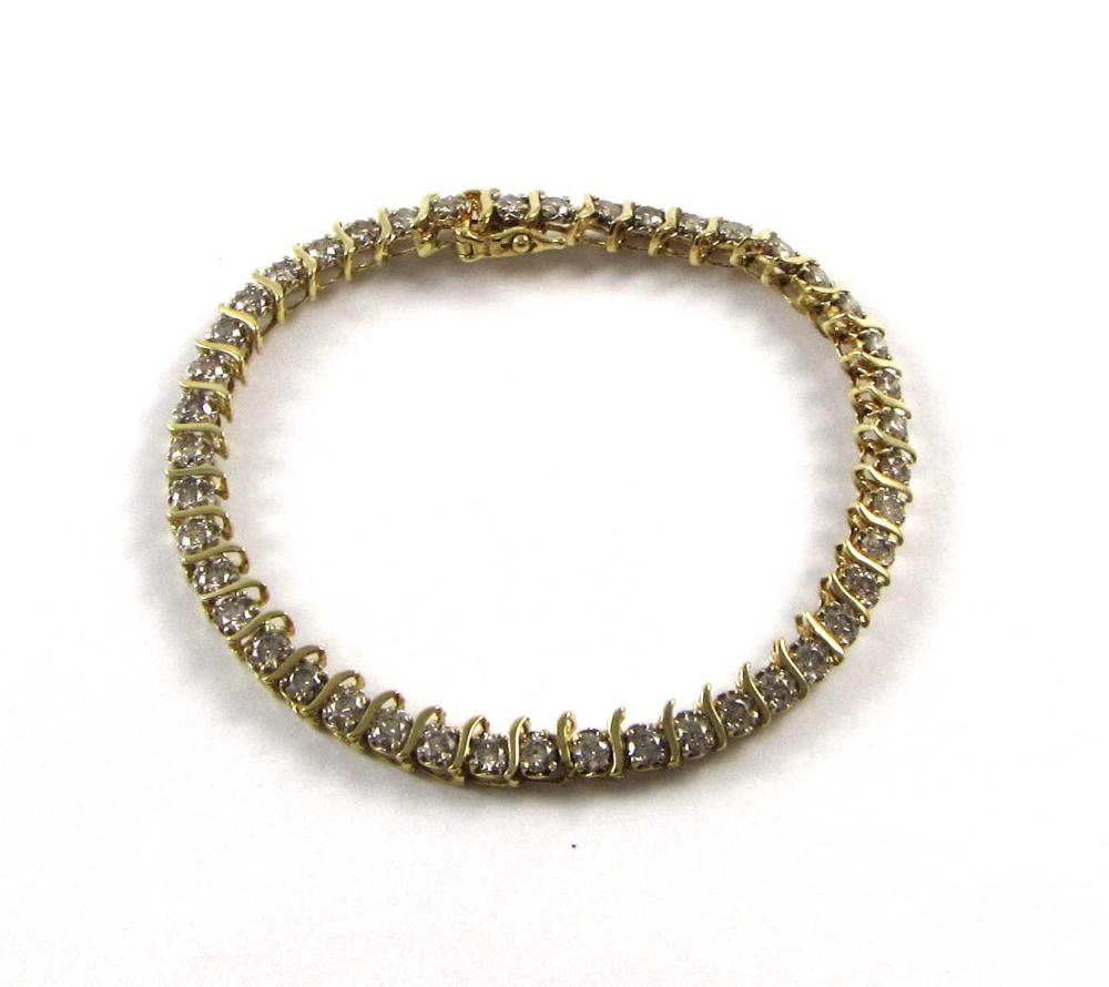 Appraisal: DIAMOND AND FOURTEEN KARAT GOLD TENNIS BRACELET measuring - in