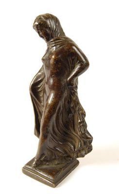 Appraisal: A bronze figure of Dionysius wearing a transparent robe raised