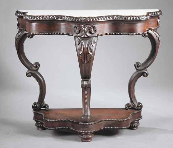 Appraisal: An English Rococo Carved Rosewood Marble Top Console mid- th