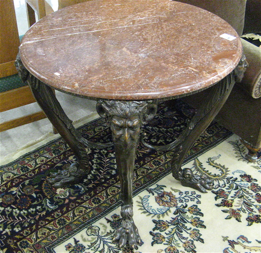 Appraisal: REGENCY STYLE BRONZE CENTER TABLE the round marble top raised