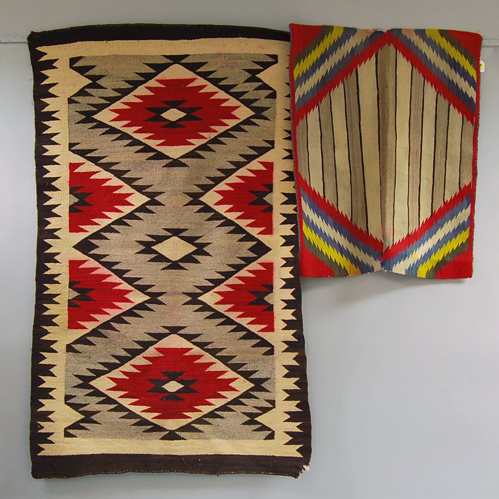 Appraisal: Two Navajo Weavings a saddle blanket and a regional rug