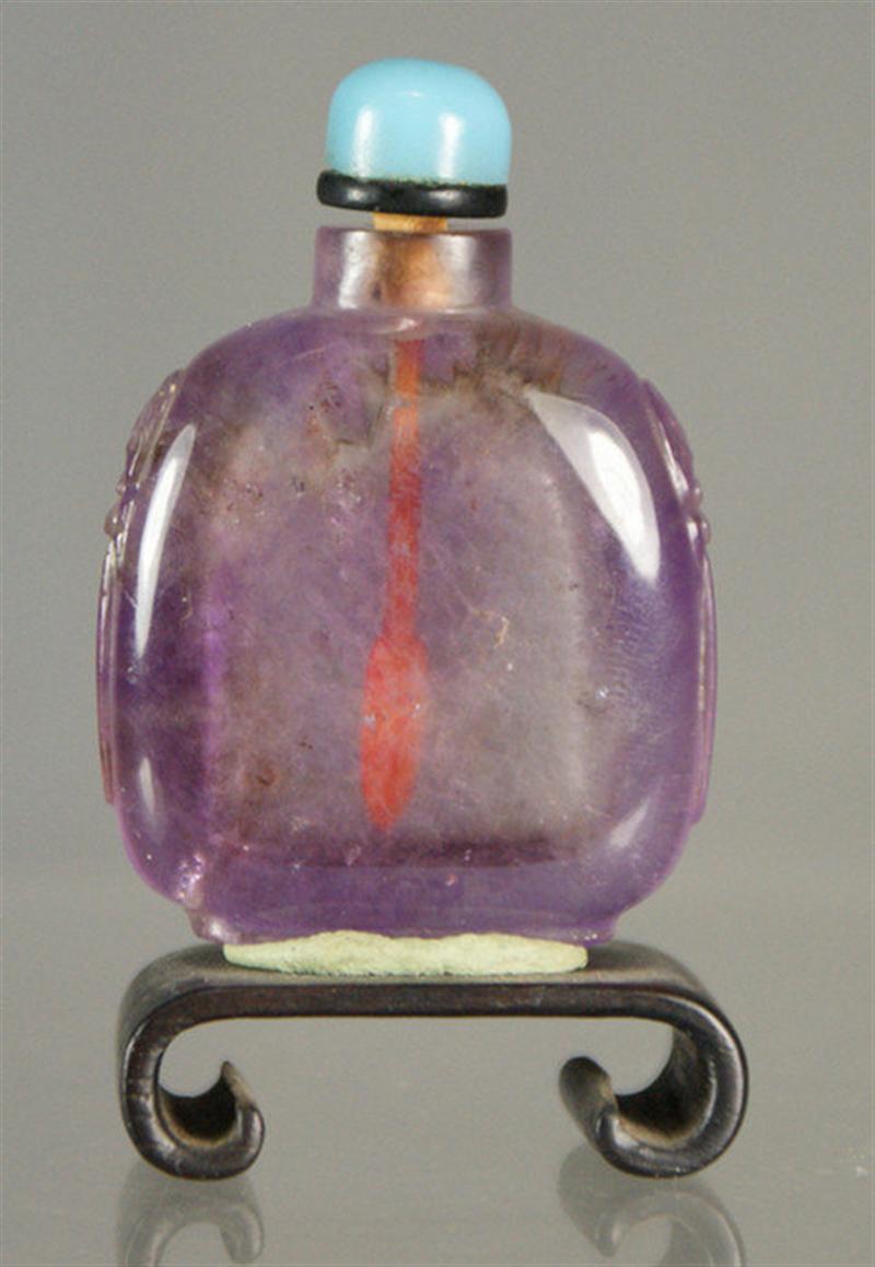 Appraisal: carved amethyst crystal snuff bottle masks on shoulders blue glass