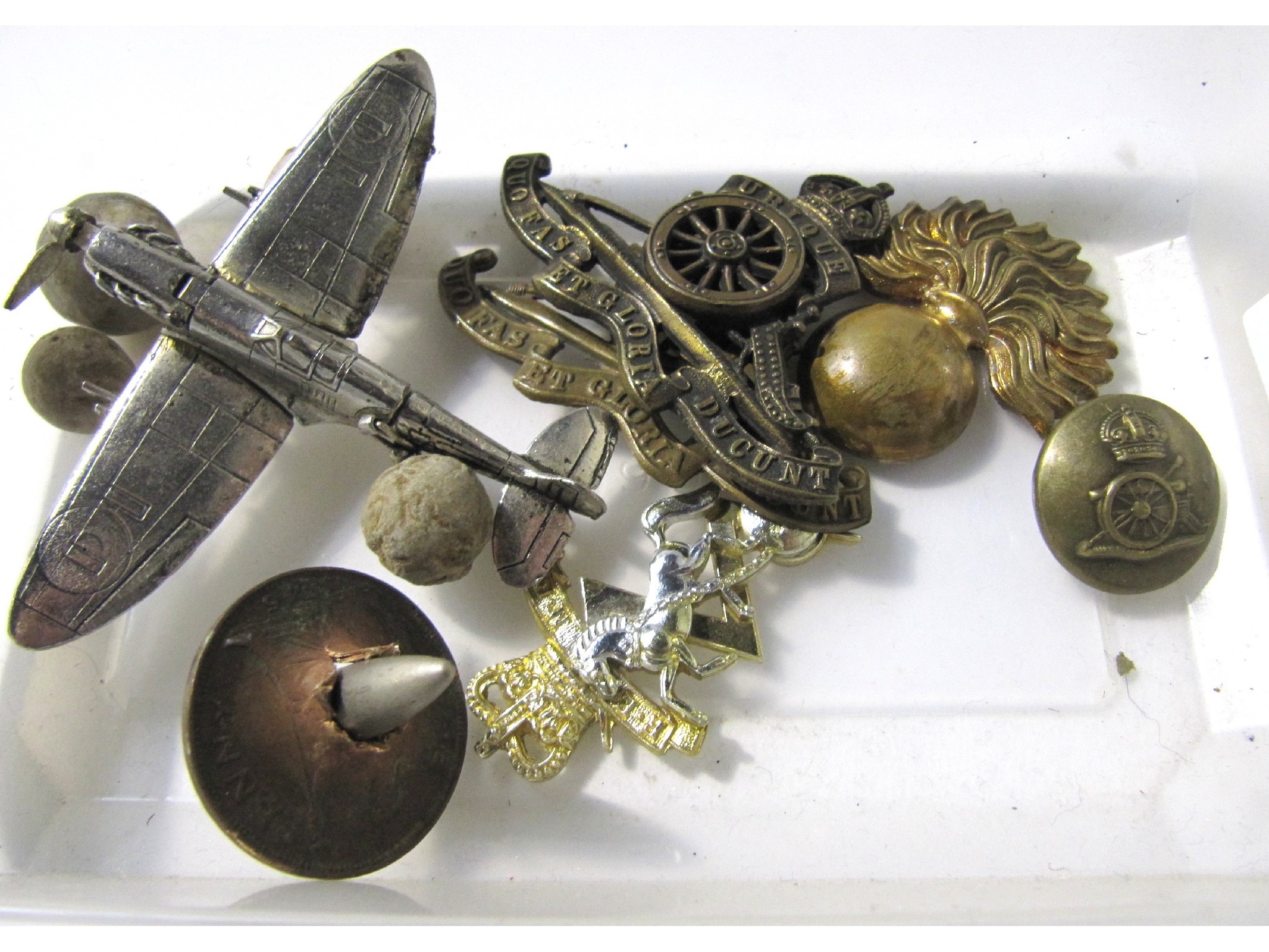 Appraisal: A lot comprising Military badges buttons musket balls and a