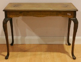 Appraisal: A reproduction walnut centre table cm wide cm deep cm