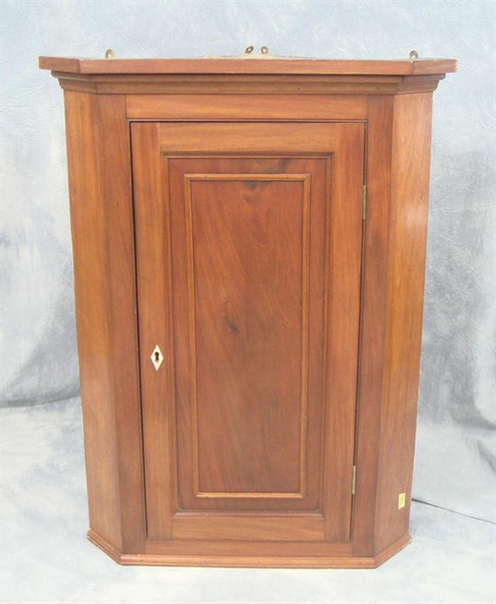 Appraisal: Mahogany American Federal hanging corner cabinet with butterfly shelves h