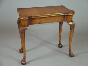 Appraisal: A George I style walnut card table early th century