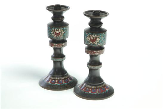 Appraisal: PAIR OF CHAMPLEVE CANDLESTICKS Asian early th century Floral and