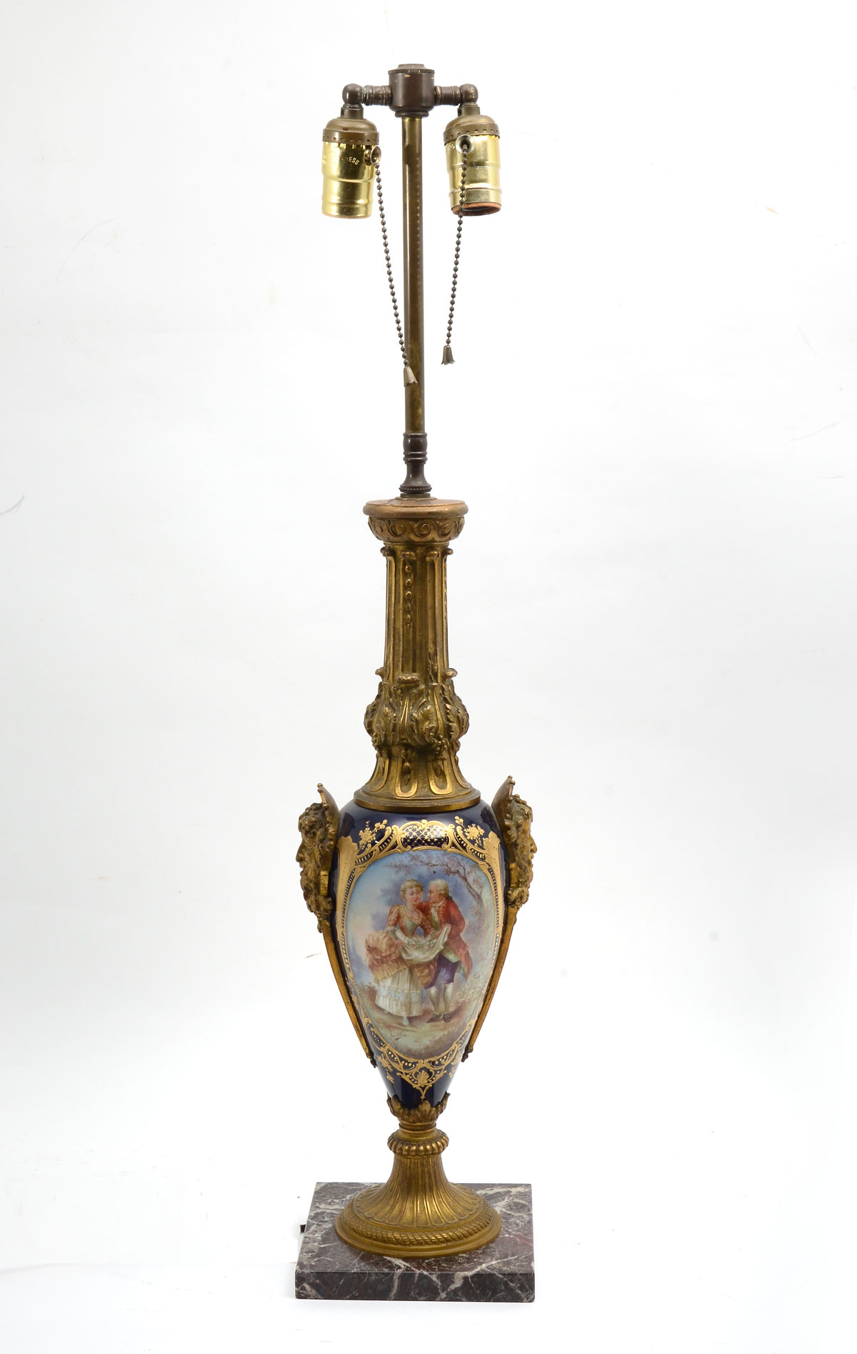 Appraisal: ORMOLU BACCHUS SEVRES LAMP Sevres light lamp having a cobalt