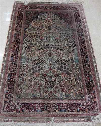 Appraisal: SILK PRAYER RUG Sino-Persian having a flower-filled cream prayer mehrab