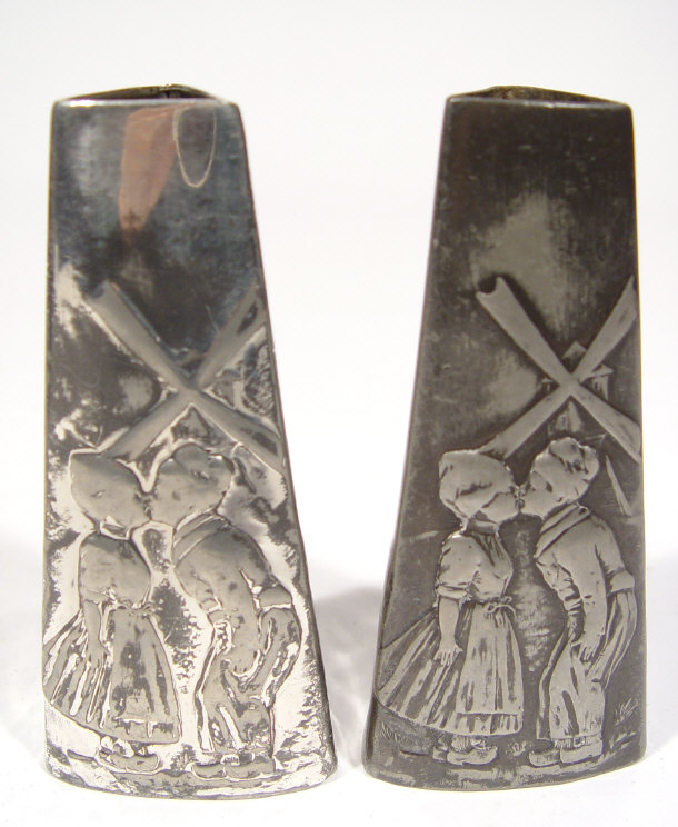 Appraisal: Pair of triangular WMF silver plated vases cast with scenes