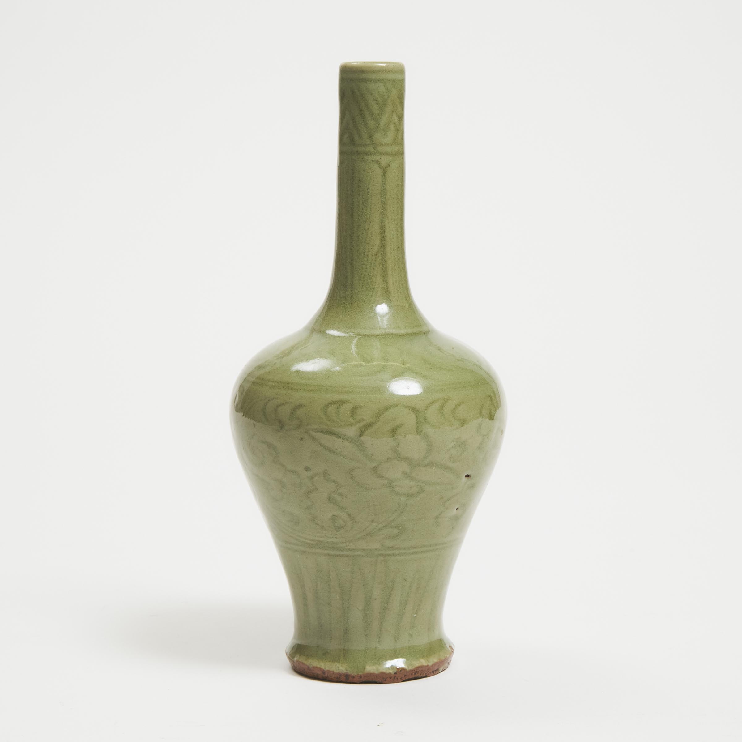 Appraisal: A Carved Yaozhou-Glazed Celadon Bottle Vase Ming Dynasty - height