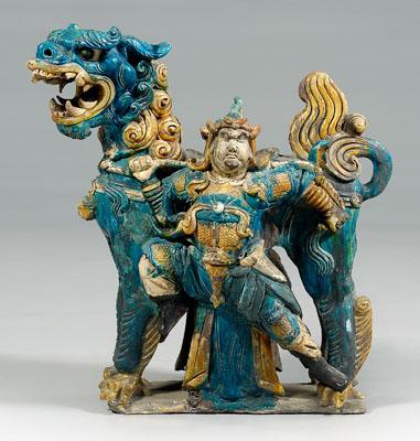 Appraisal: Chinese tileworks Buddhist lion stand glazed in turquoise yellow cream