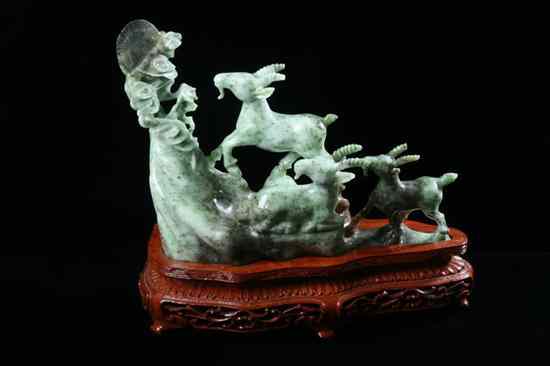 Appraisal: CHINESE APPLE GREEN AND GREY JADE FIGURES OF THREE GOATS