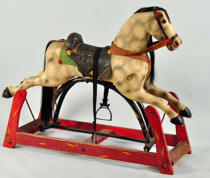 Appraisal: Early Platform Rocking Horse Toy Description American Wood and composition