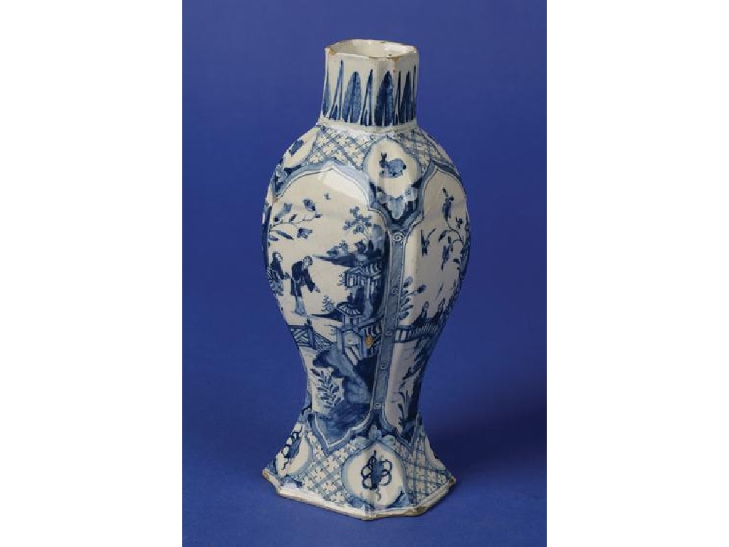 Appraisal: A DUTCH DELFTWARE VASE of shaped baluster form painted in