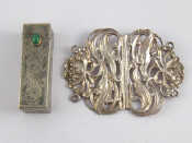 Appraisal: A silver Art Nouveau nurse's buckle converted to a brooch