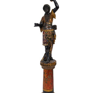 Appraisal: An Italian Carved and Painted Torchere of a Moor on