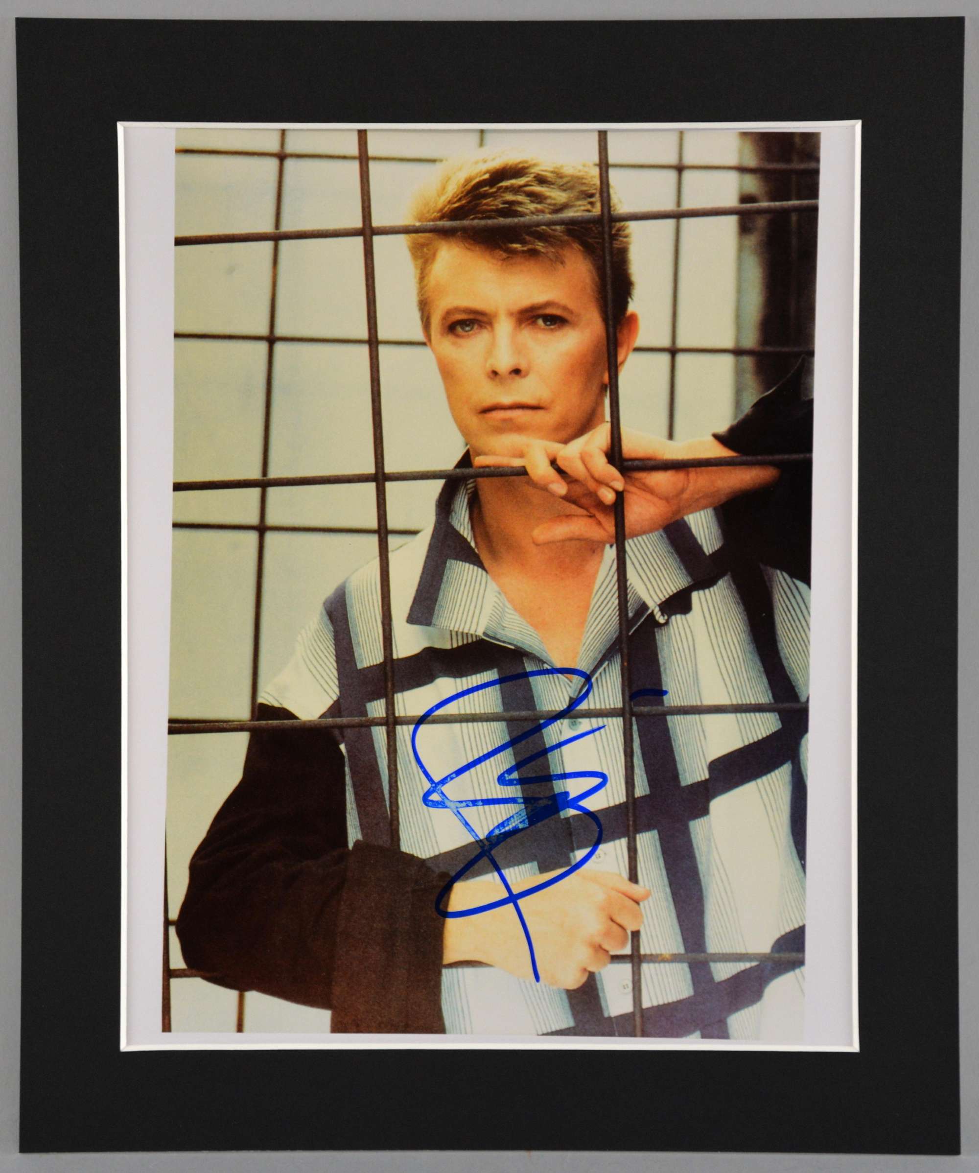 Appraisal: David Bowie x inch colour photo signed to the front