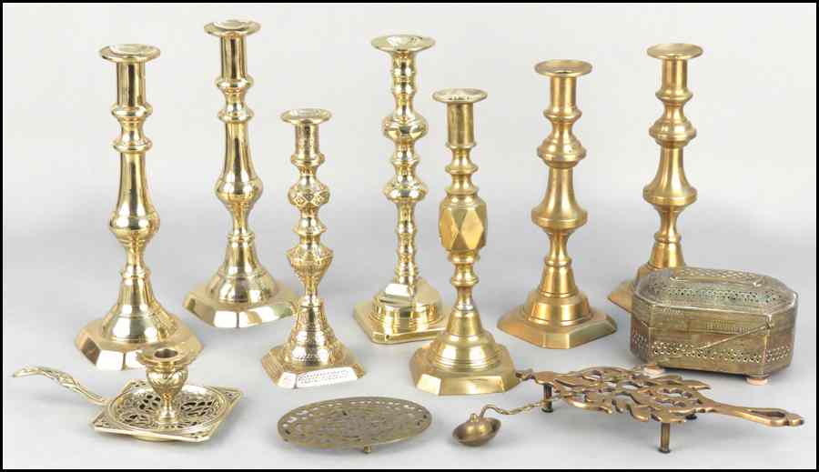 Appraisal: TWO PAIRS OF BRASS CANDLESTICKS Together with three Brass single