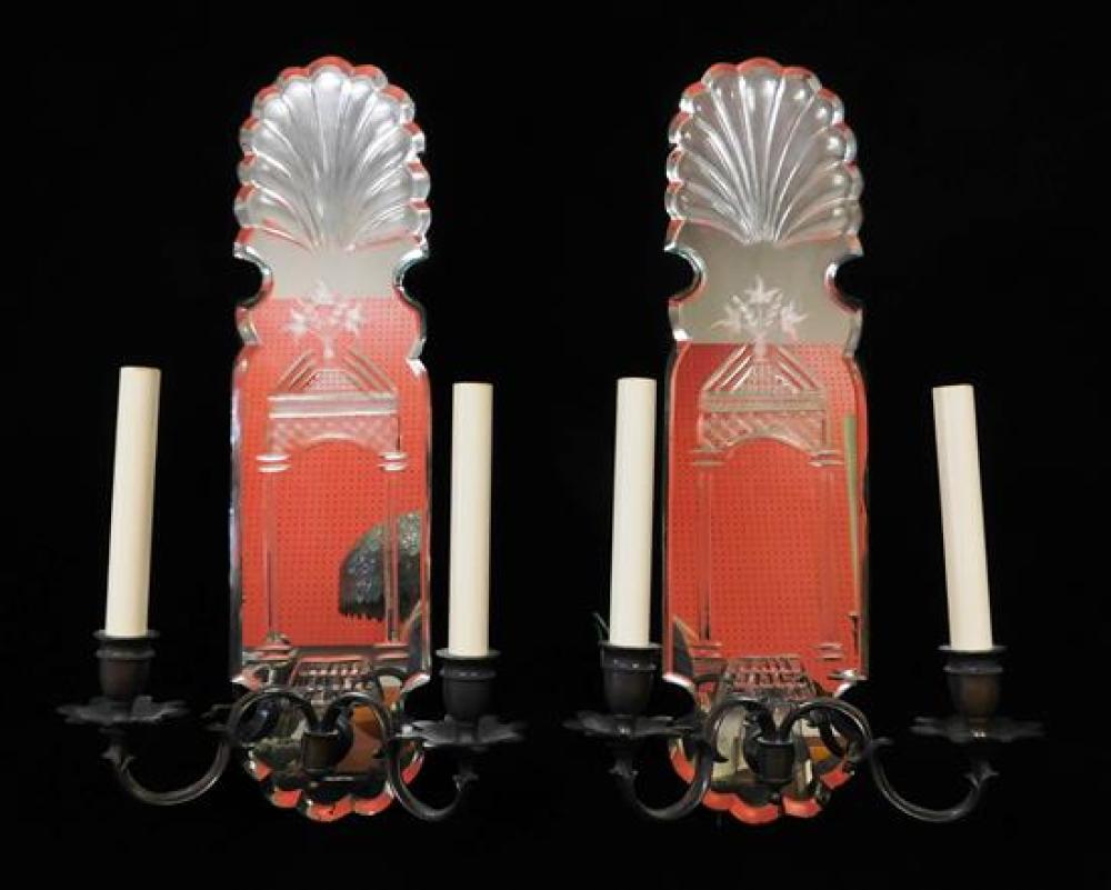 Appraisal: Pair of electrified two light sconces elaborate mirror backing on