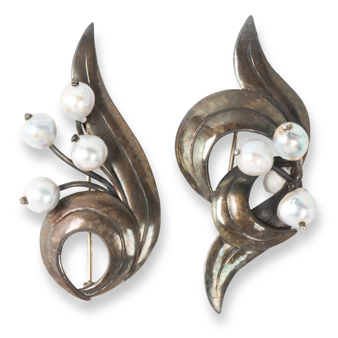 Appraisal: A GROUP OF PEARL AND STERLING SILVER BROOCHES A group