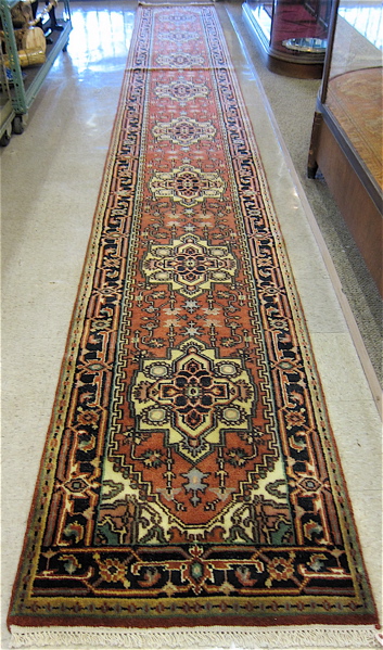 Appraisal: HAND KNOTTED ORIENTAL LONG RUG Persian Serapi design of eight