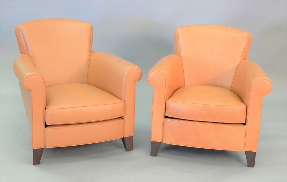 Appraisal: Pair of tan leather upholstered contemporary club chairs Estate of