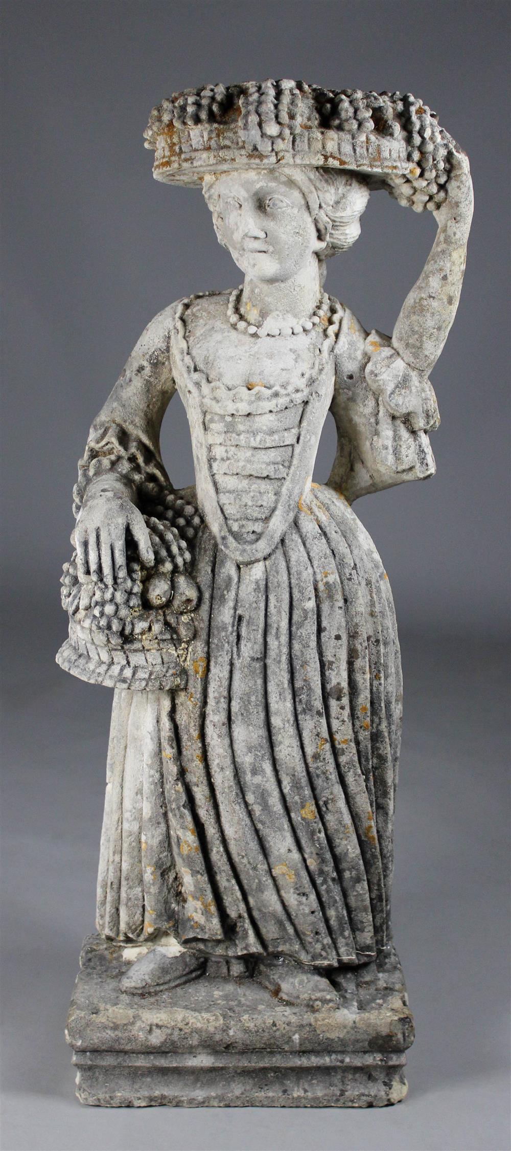 Appraisal: ANTIQUE STONE FIGURE OF A MAIDEN WITH A FRUIT BASKET