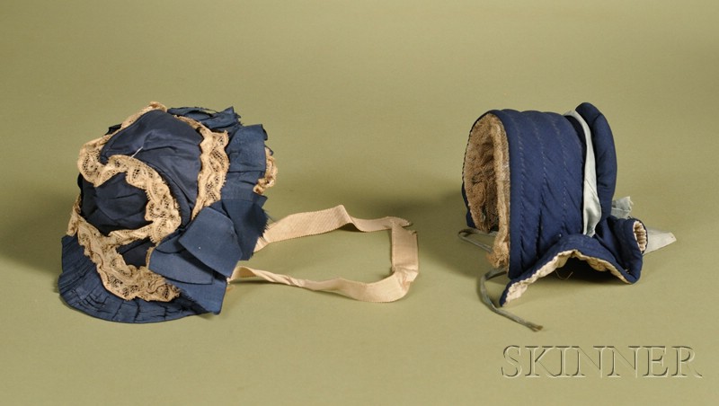 Appraisal: Two Early Doll Bonnets both navy blue silk the smaller