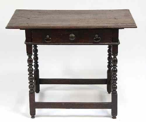 Appraisal: An th Century and later oak side table fitted a