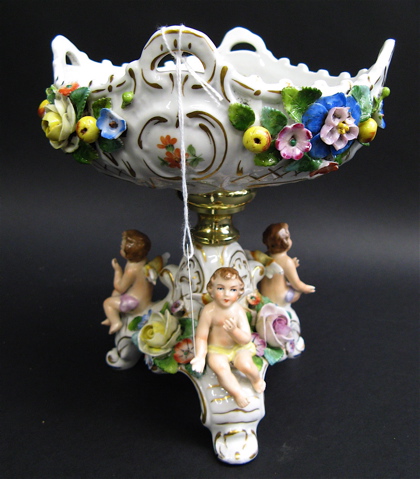 Appraisal: GERMAN SITZENDORF PORCELAIN COMPOTE with cherubs applied floral and fruit