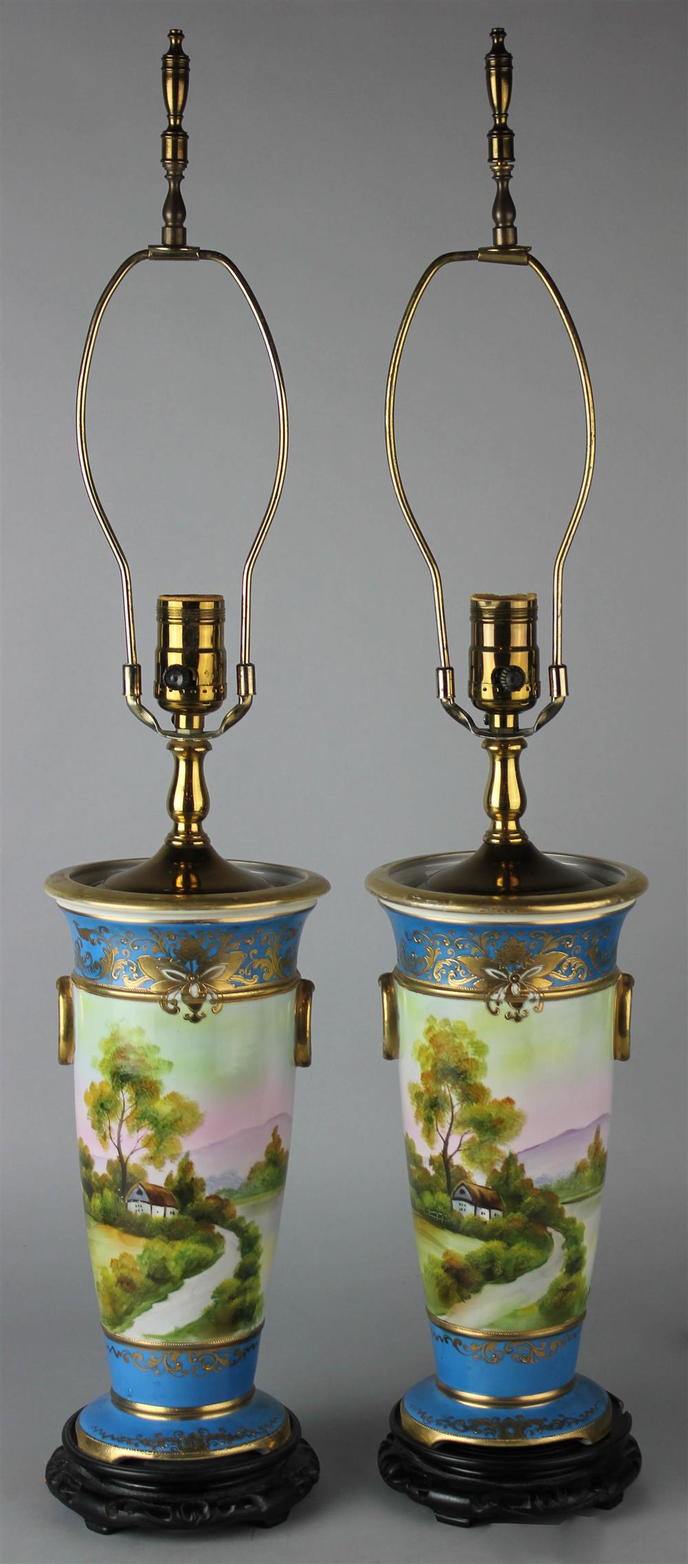 Appraisal: PAIR OF TURQUOISE GROUND PORCELAIN TAPERING TABLE LAMPS with fixed