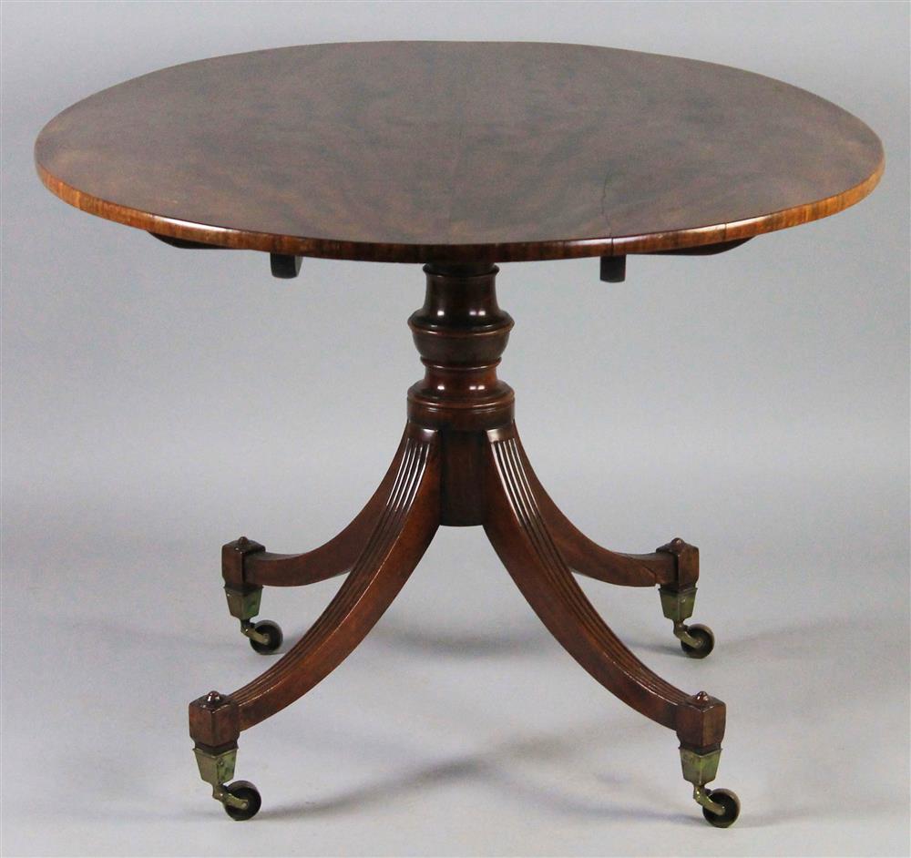 Appraisal: GEORGE III MAHOGANY BREAKFAST TABLE the oval tilting top with