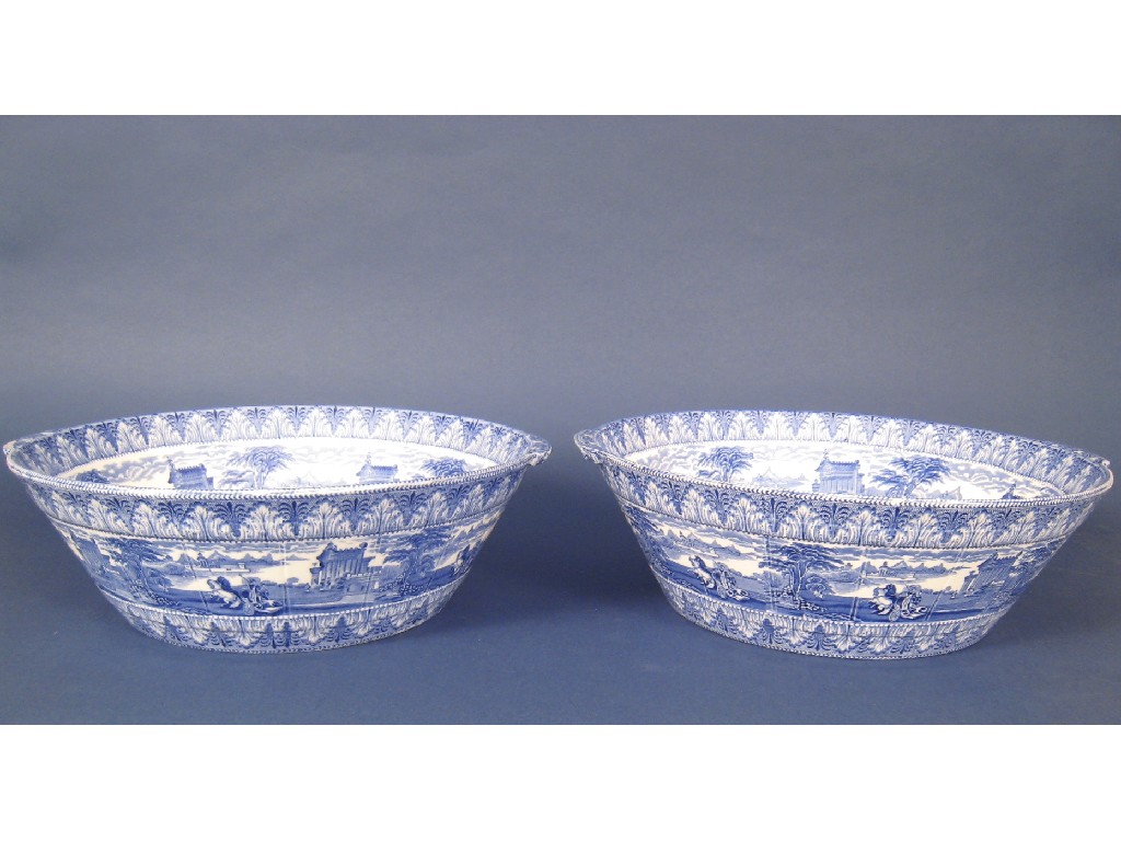 Appraisal: Pair of Cauldon large blue and white Bowls printed charioteers