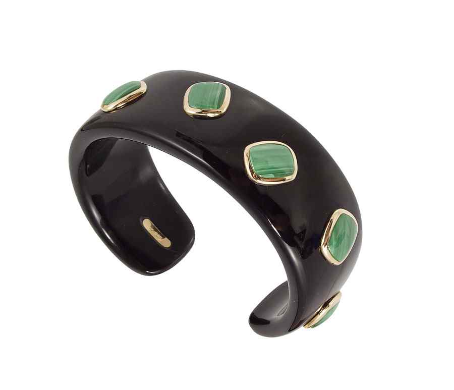 Appraisal: POLISHED BLACK STONE AND MALACHITE CUFF BRACELET cushion shaped cabochon