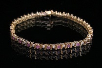 Appraisal: A Ladies' Gold Ruby and Diamond Bracelet k yellow gold