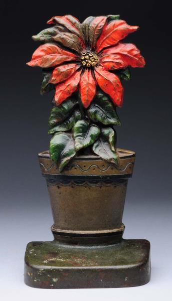 Appraisal: Cast Iron Poinsettia Doorstop Made by the Judd Company and