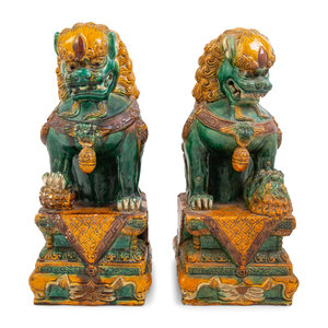 Appraisal: A Pair of Large Sancai Glazed Temple Guardians th Century