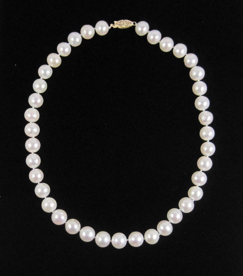 Appraisal: PRINCESS LENGTH PEARL AND FOURTEEN KARAT GOLD NECKLACE The hand-knotted