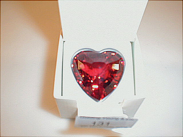 Appraisal: A Swarovski crystal heart shaped paperweight boxed