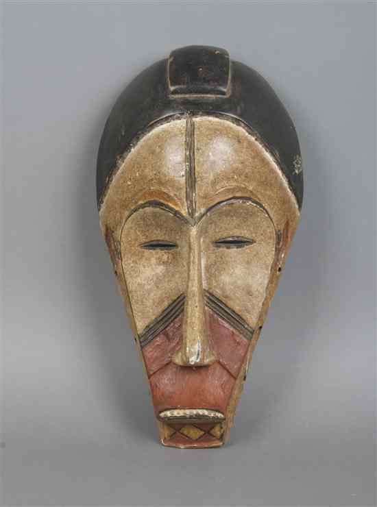 Appraisal: A Carved and Polychrome Decorated Mask Fang Gabon of elongated